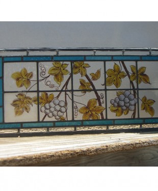 stained glass with painted grapes